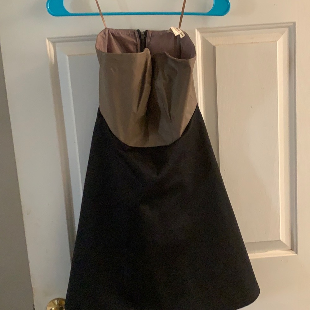 Double zero dress Black and tan in color